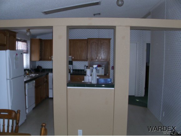4390 North Shadow Road Kingman, AZ 86409 - Photo 6 of 36 kitchen from dining room