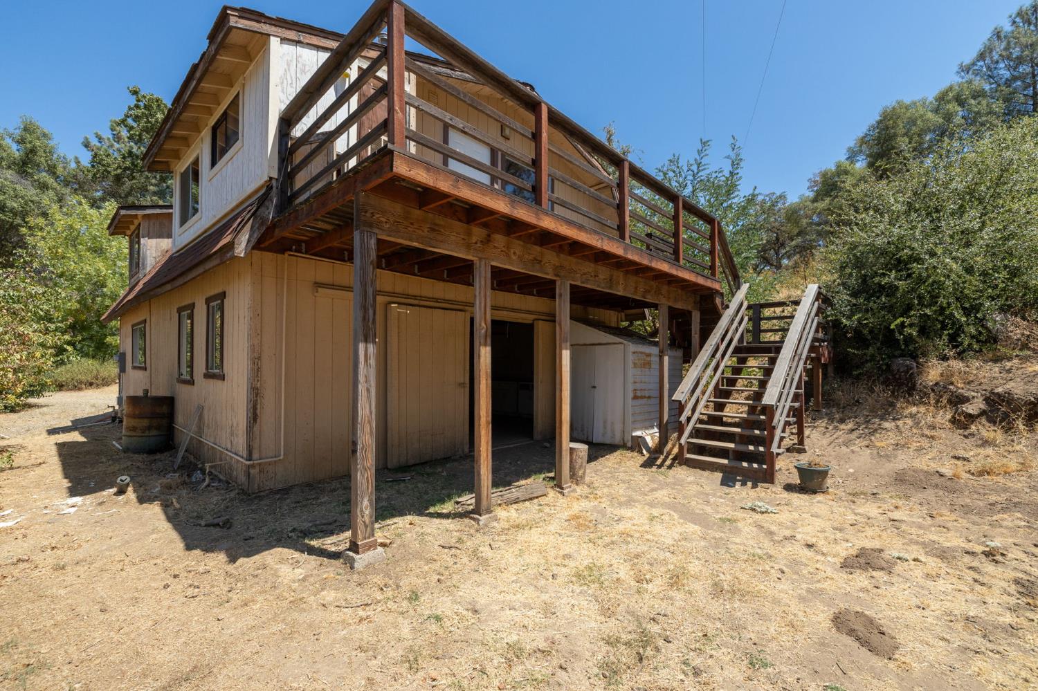 3981 Snow Creek Road Mariposa, CA 95338 - Photo 53 of 66 a view of a house with a yard