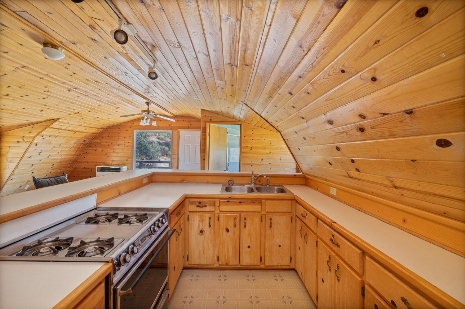3981 Snow Creek Road Mariposa, CA 95338 - Photo 58 of 66 a kitchen with a stove and a sink