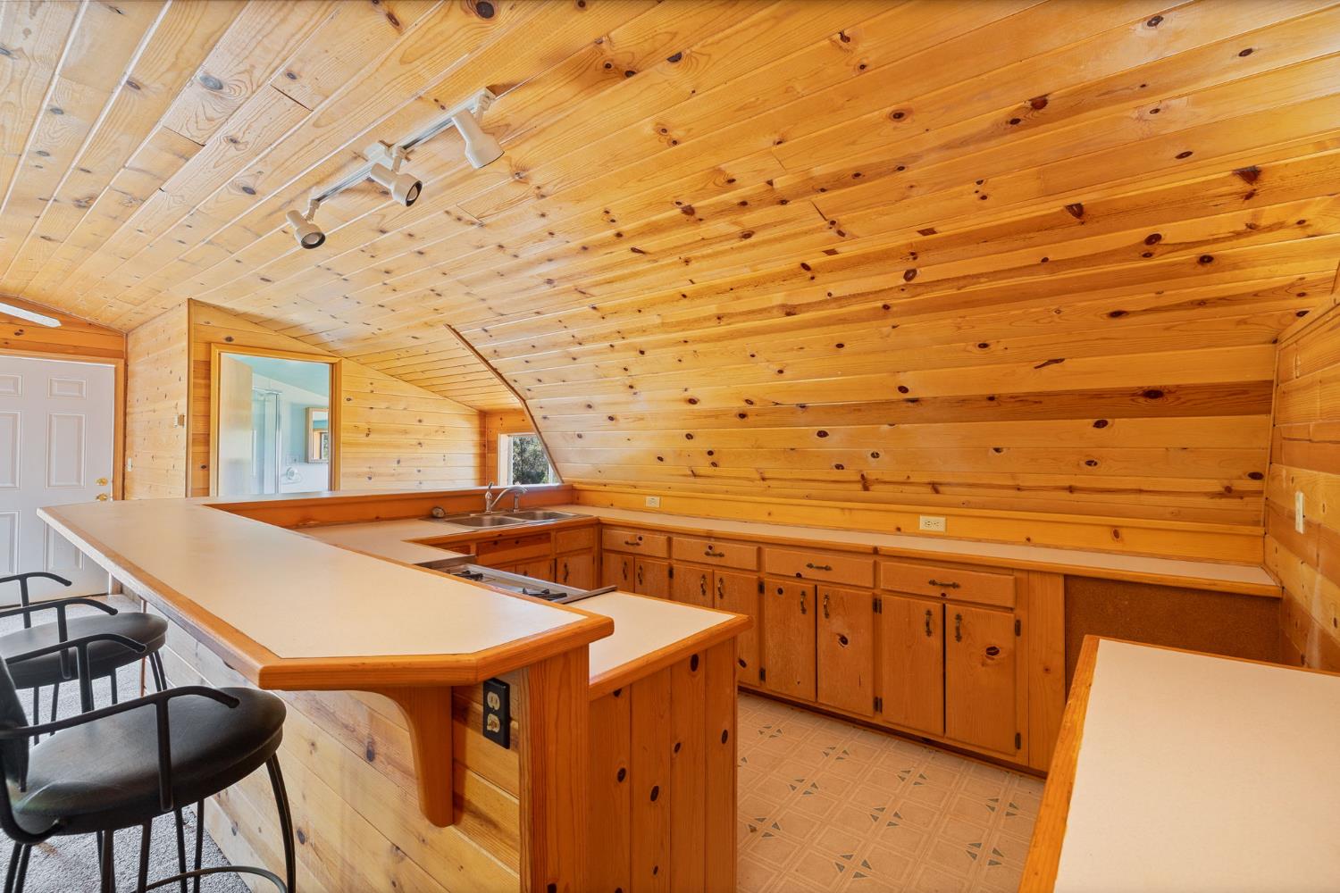 3981 Snow Creek Road Mariposa, CA 95338 - Photo 59 of 66 a view of a balcony with chairs