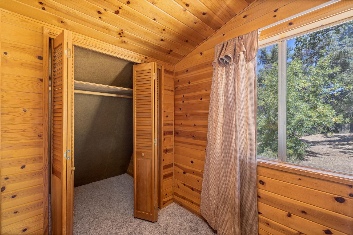 3981 Snow Creek Road Mariposa, CA 95338 - Photo 65 of 66 a view of walk in closet with clothes