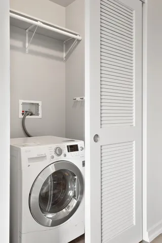 a utility room with dryer and washer