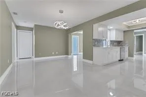 a view of a kitchen with a sink