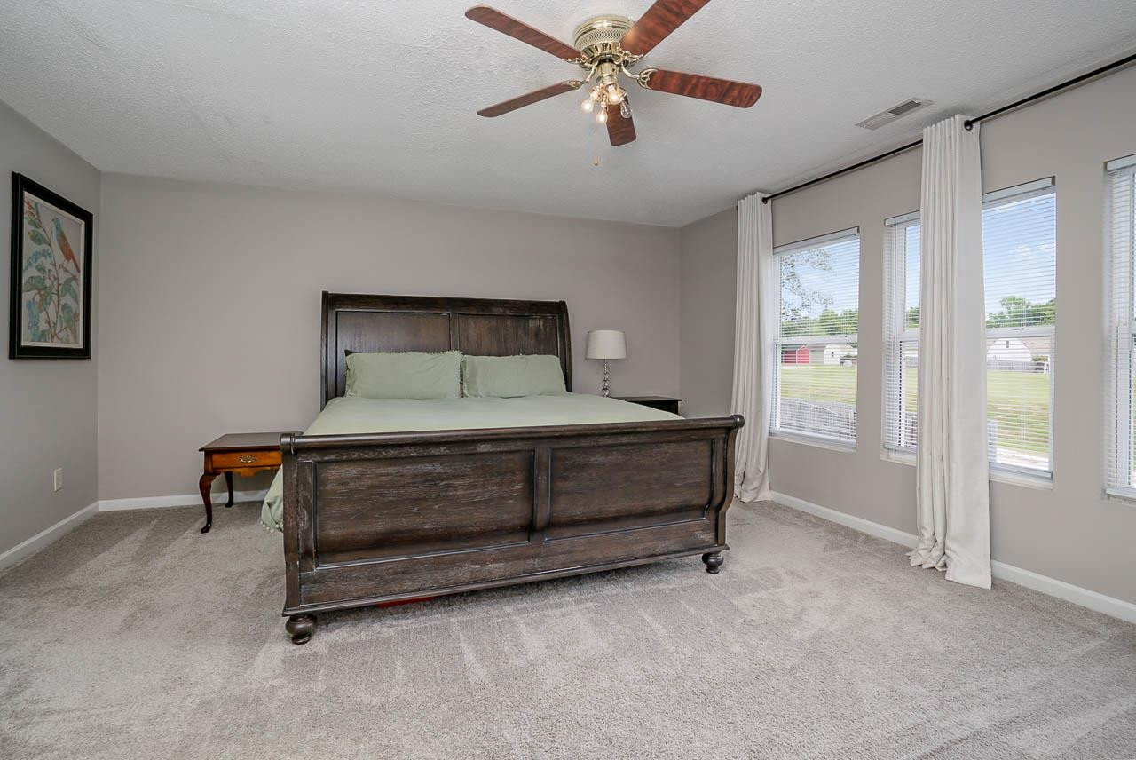 2458 Quarry Ridge Lane Raleigh, NC 27610 - Photo 8 of 15 Fit for a KING...sized bed that is! This owner's suite has tons of natural light, a large Walk In Closet and private bath/spa! Master Bedroom