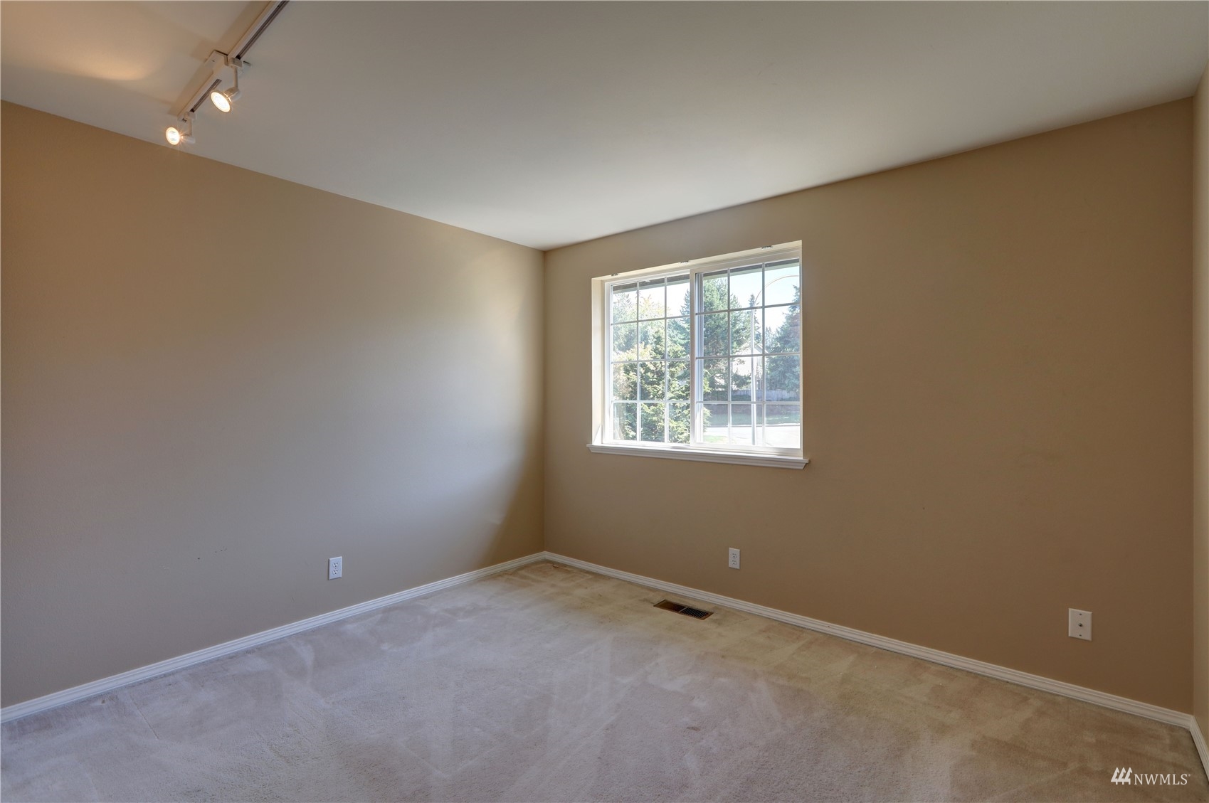 1635 Field Place Northeast Renton, WA 98059 - Photo 24 of 28 an empty room with windows