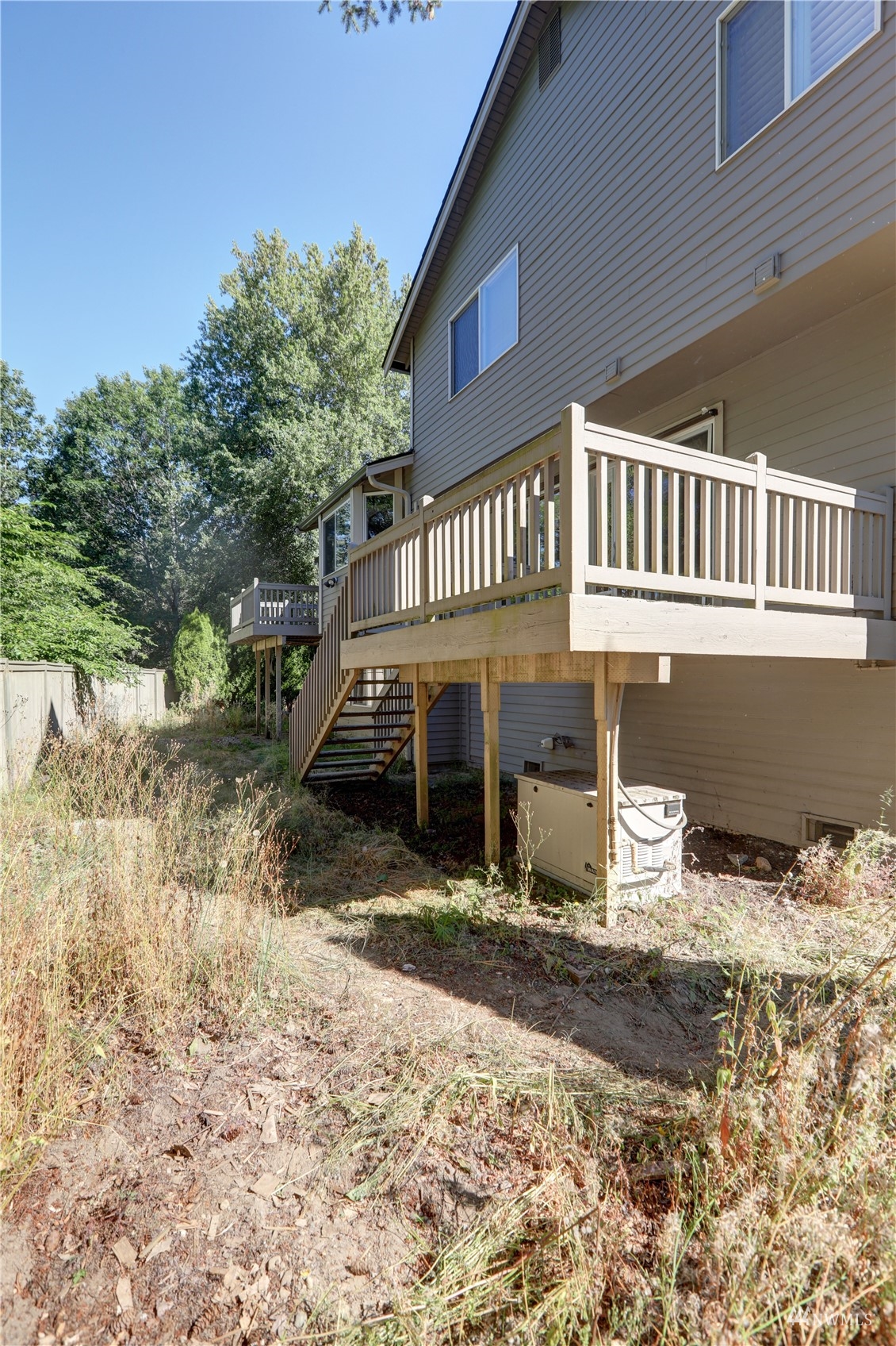 1635 Field Place Northeast Renton, WA 98059 - Photo 27 of 28 a front view of a house with a yard