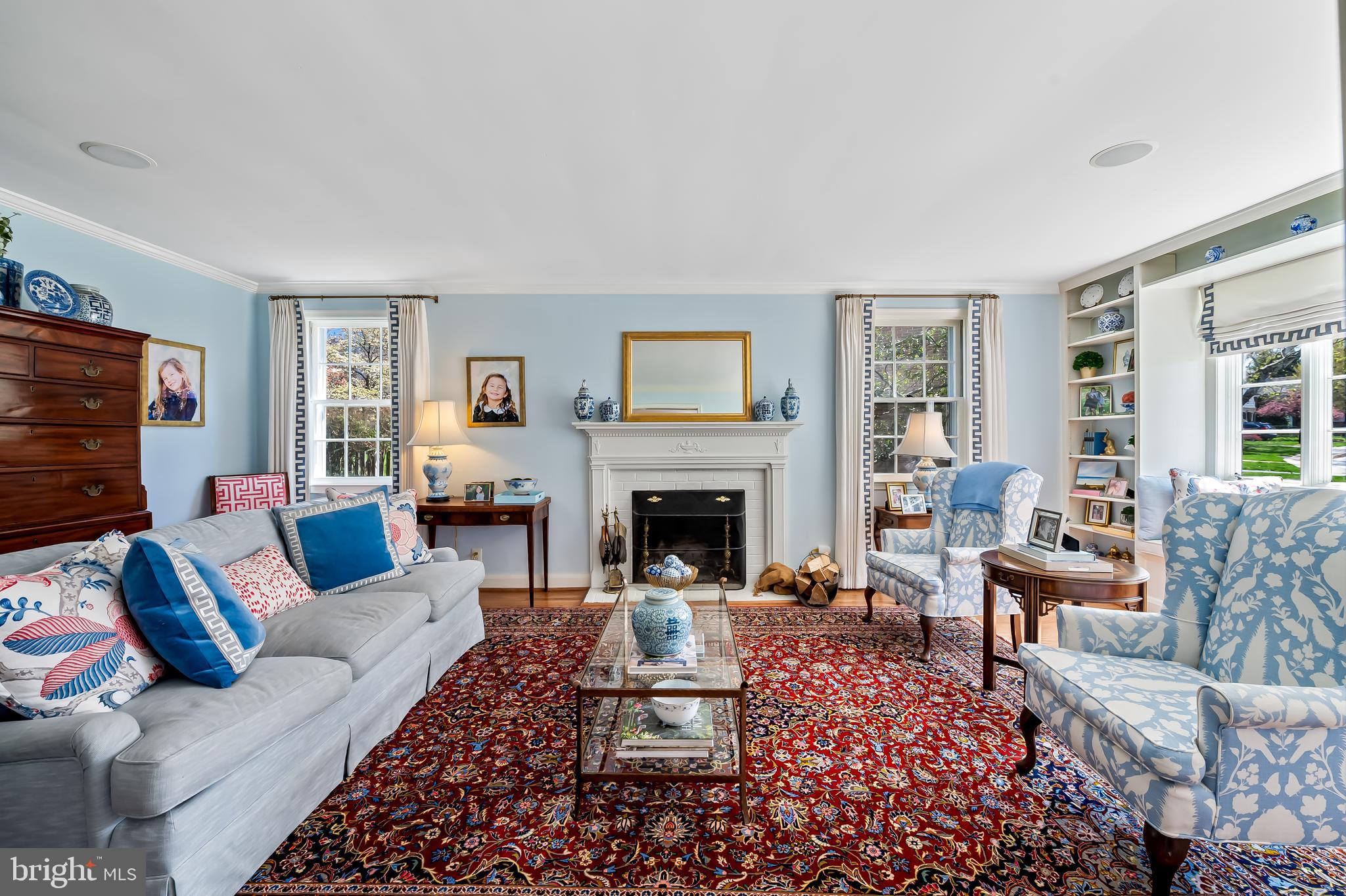 5911 Meadowood Road Baltimore, MD 21212 - Photo 15 of 52 a living room with furniture a rug a window and a fireplace