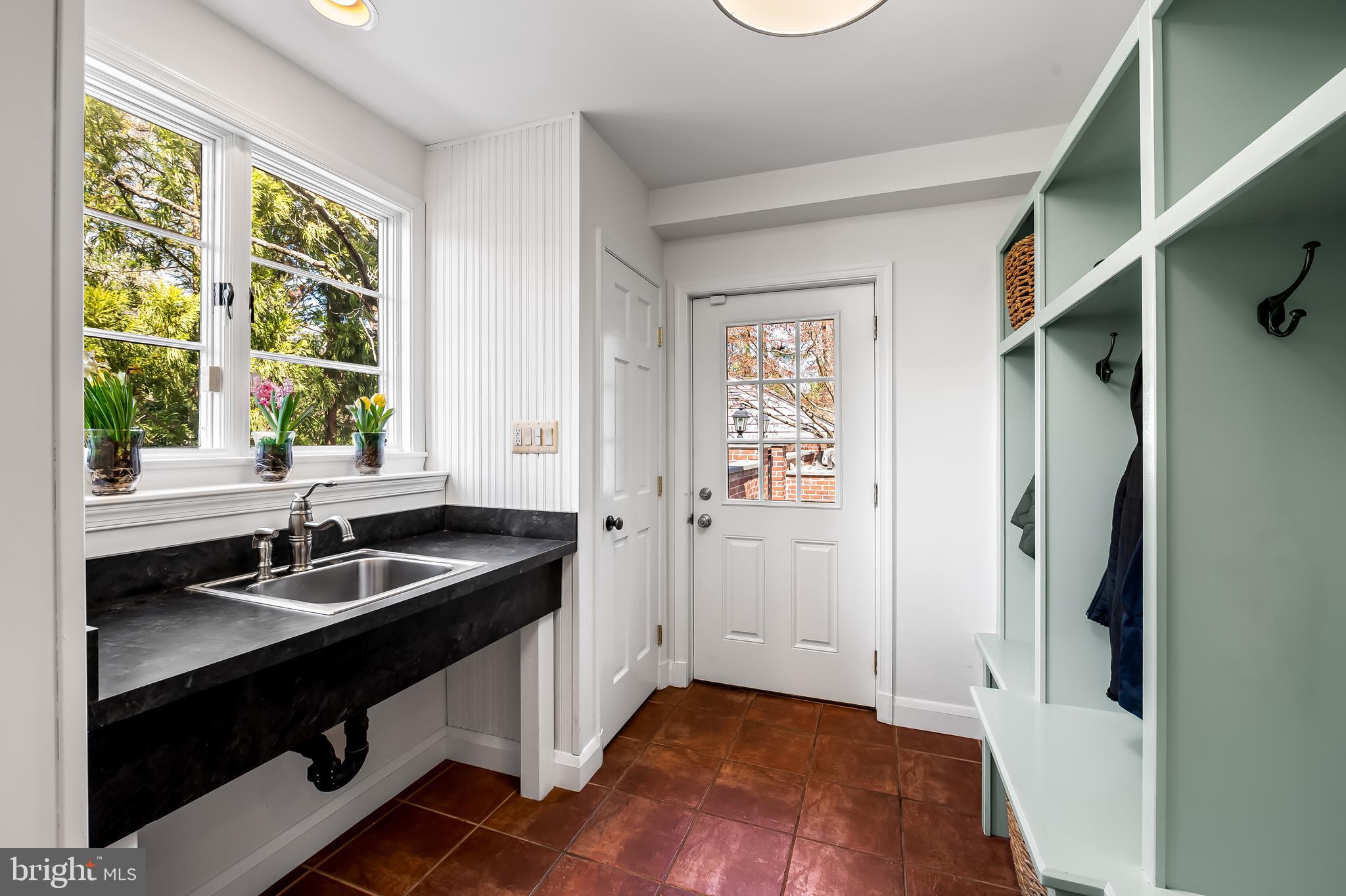 5911 Meadowood Road Baltimore, MD 21212 - Photo 23 of 53 Mudroom with sink and coat closet