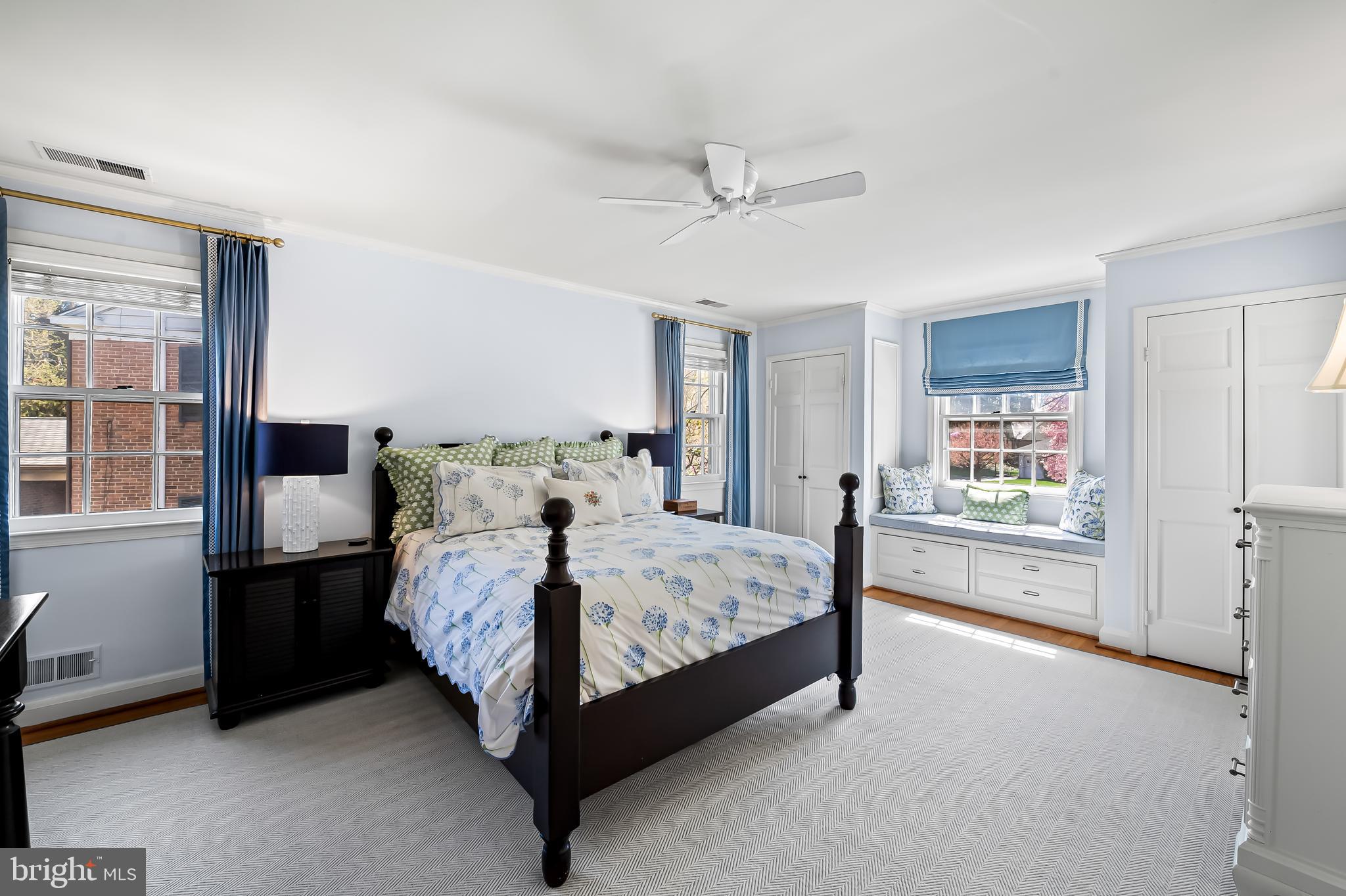 5911 Meadowood Road Baltimore, MD 21212 - Photo 24 of 52 a bed sitting in a spacious bedroom next to a window