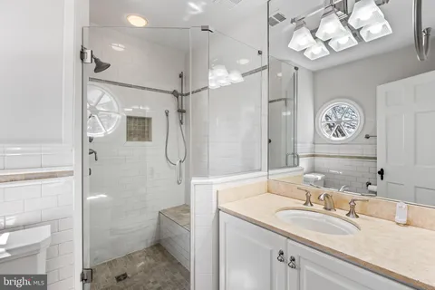 a room with a dresser and a window