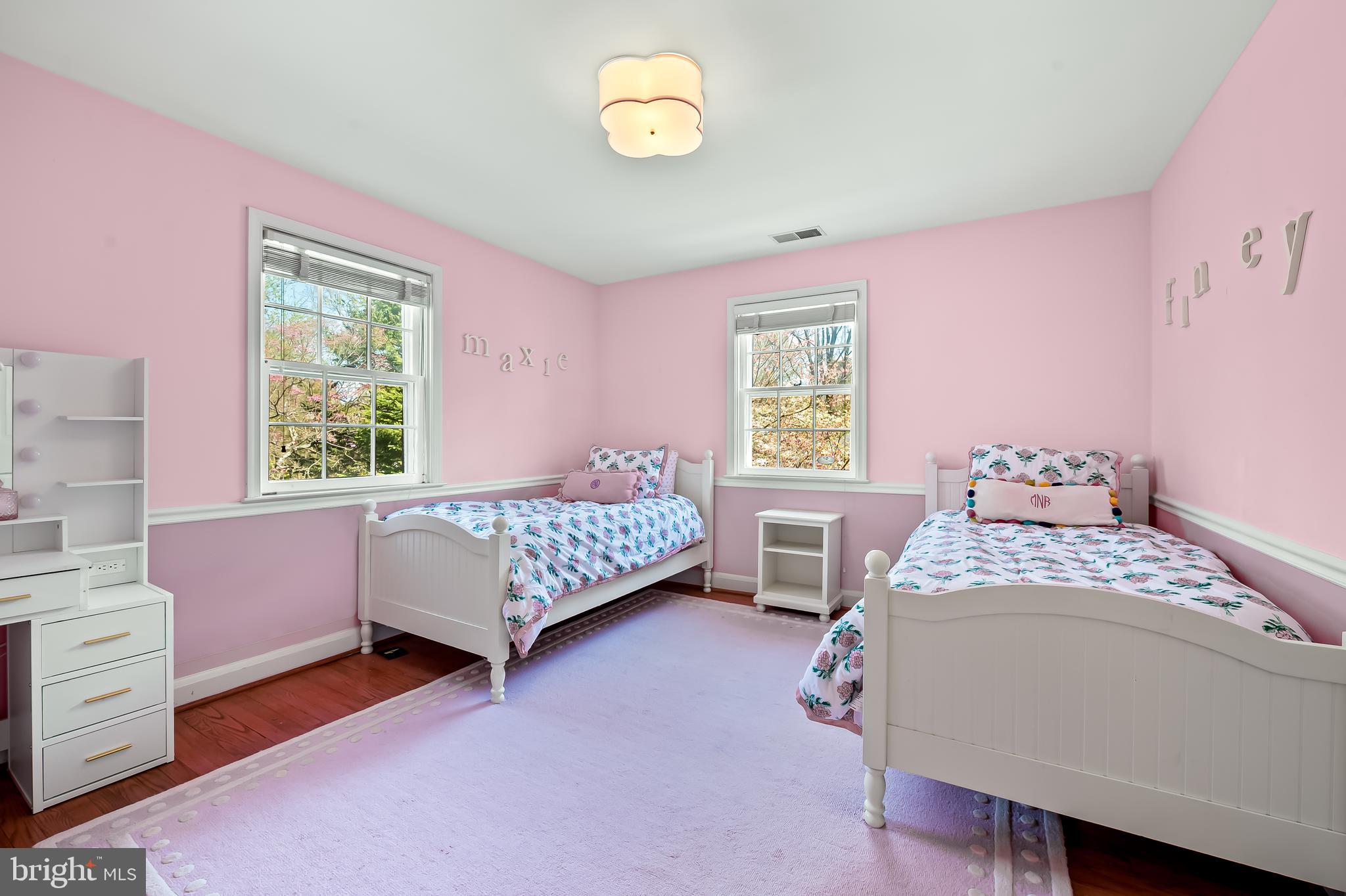 5911 Meadowood Road Baltimore, MD 21212 - Photo 30 of 52 a bedroom with a bed and a window