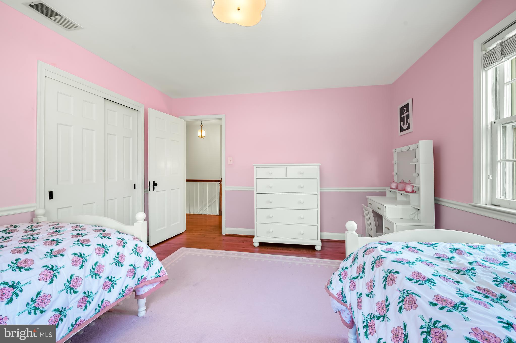 5911 Meadowood Road Baltimore, MD 21212 - Photo 31 of 52 a bedroom with a bed and a window