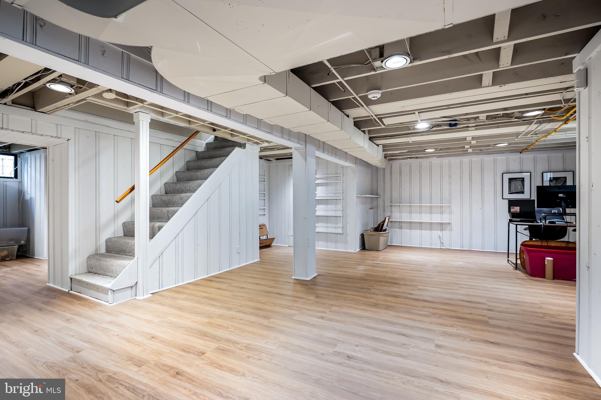 5911 Meadowood Road Baltimore, MD 21212 - Photo 36 of 52 a view of an empty room with wooden floor