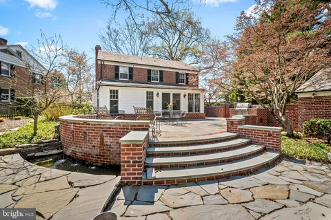 a view of a patio with a yard