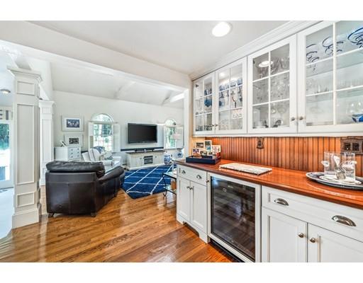 20 Seager Farm Road Marshfield, MA 02050 - Photo 11 of 30 a living room with stainless steel appliances kitchen island granite countertop a sink and a stove top oven