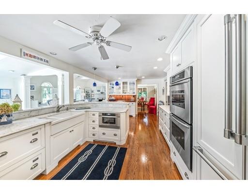 20 Seager Farm Road Marshfield, MA 02050 - Photo 12 of 30 a open kitchen with stainless steel appliances granite countertop a refrigerator and a stove
