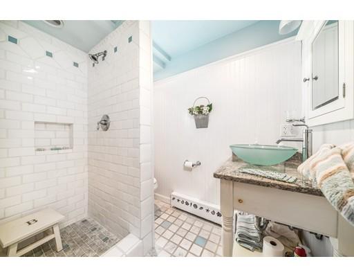 20 Seager Farm Road Marshfield, MA 02050 - Photo 16 of 30 a bathroom with a granite countertop sink a mirror and shower