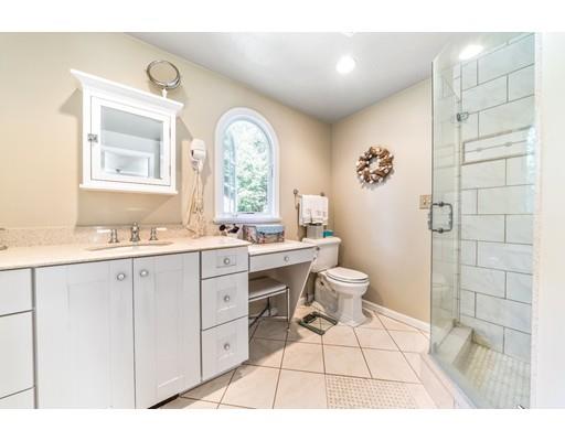 20 Seager Farm Road Marshfield, MA 02050 - Photo 21 of 30 a spacious bathroom with a double vanity sink toilet mirror and shower