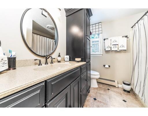 20 Seager Farm Road Marshfield, MA 02050 - Photo 24 of 30 a bathroom with a sink a toilet and a mirror