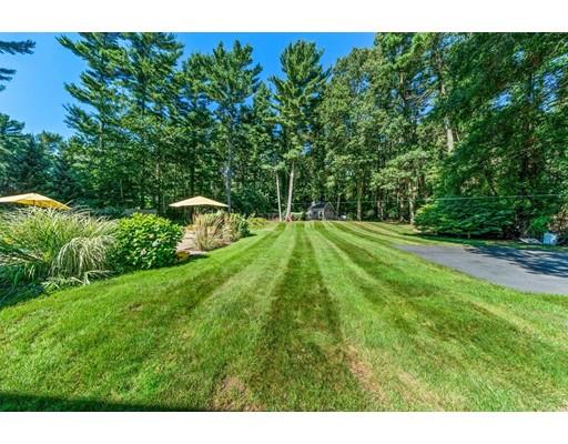 20 Seager Farm Road Marshfield, MA 02050 - Photo 30 of 30 a grassy field with some trees in the background