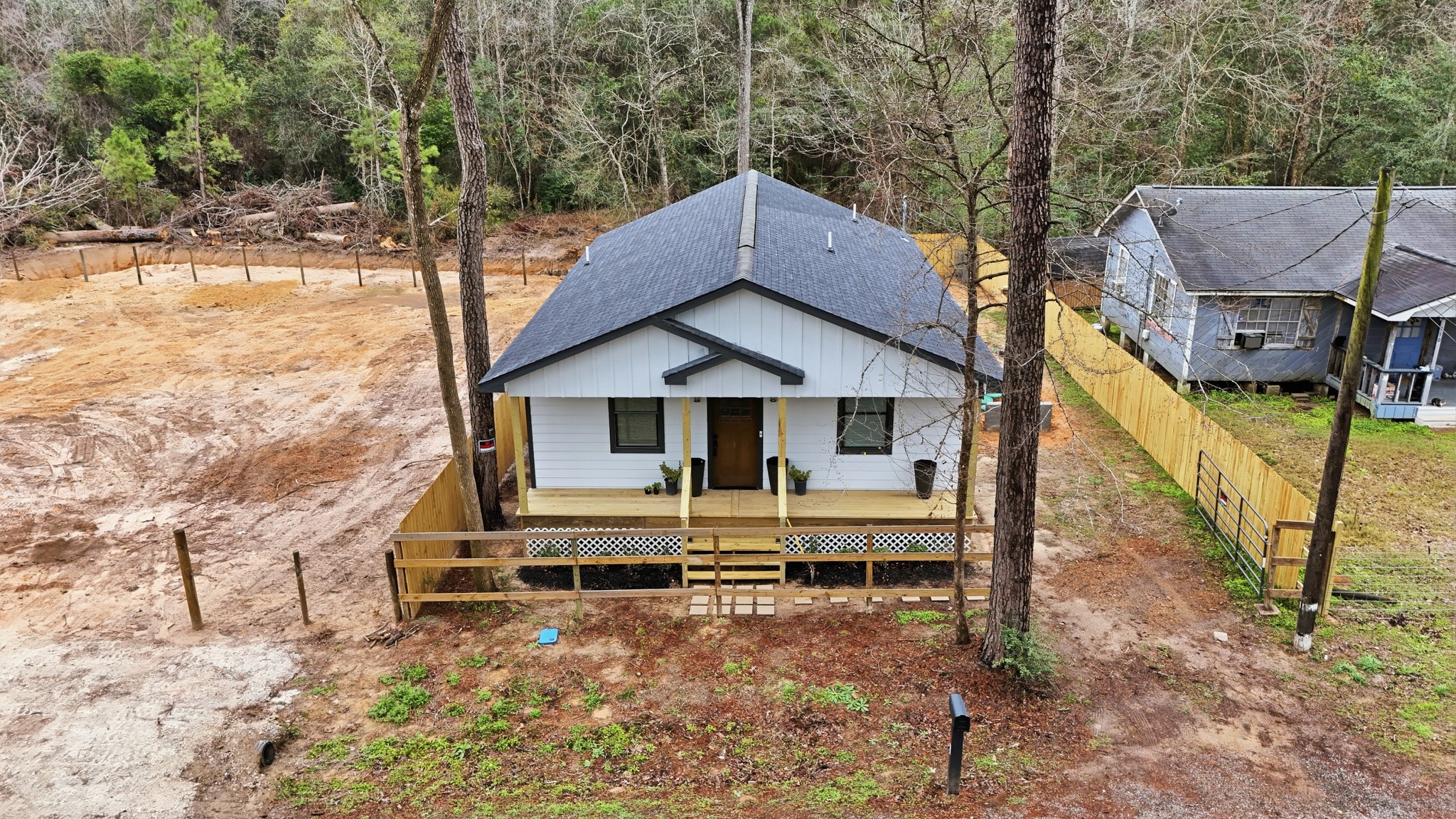 160 Oak Lane Shepherd, TX 77371 - Photo 2 of 15 a front view of a house with a yard