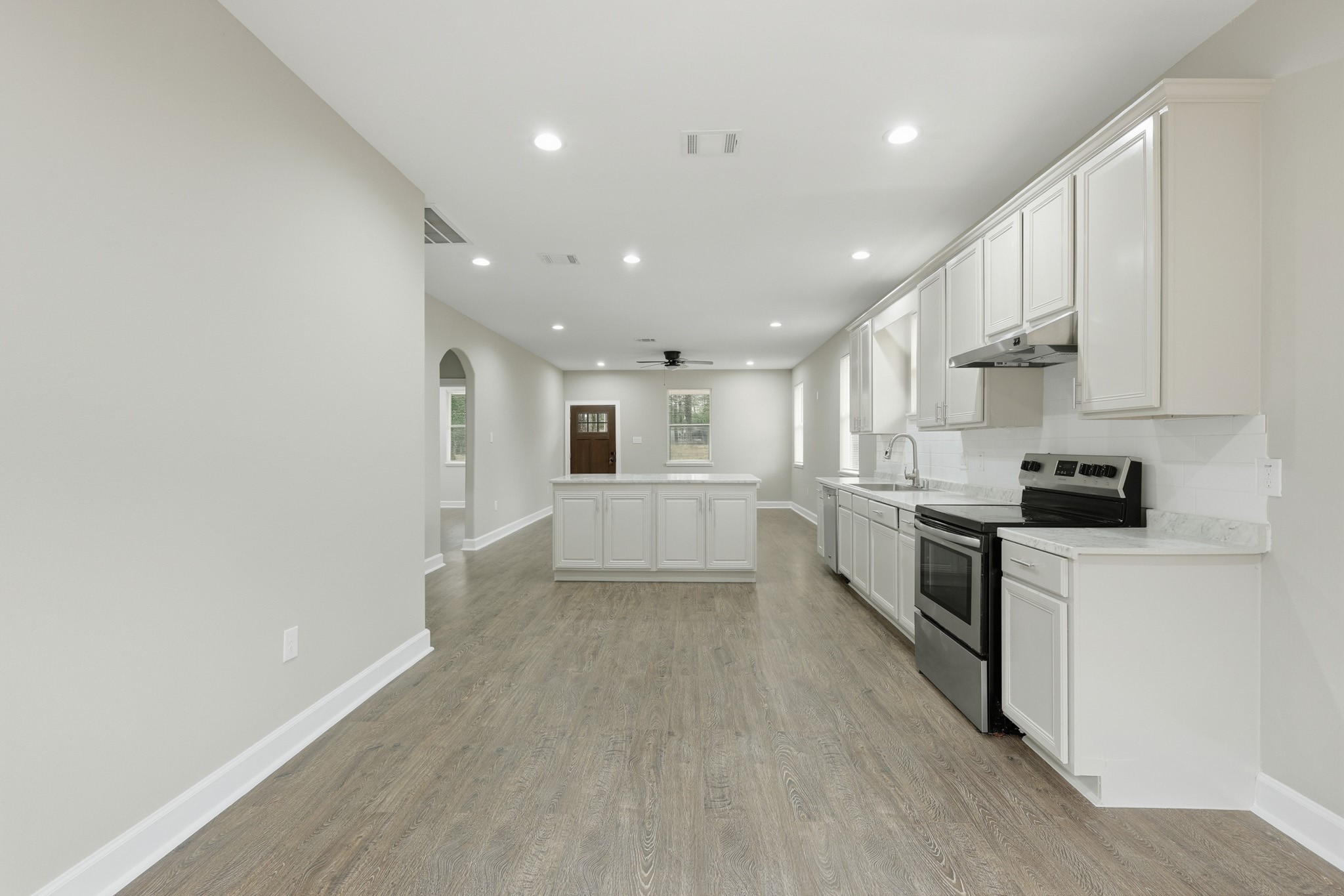 160 Oak Lane Shepherd, TX 77371 - Photo 8 of 15 a view of kitchen with sink and refrigerator