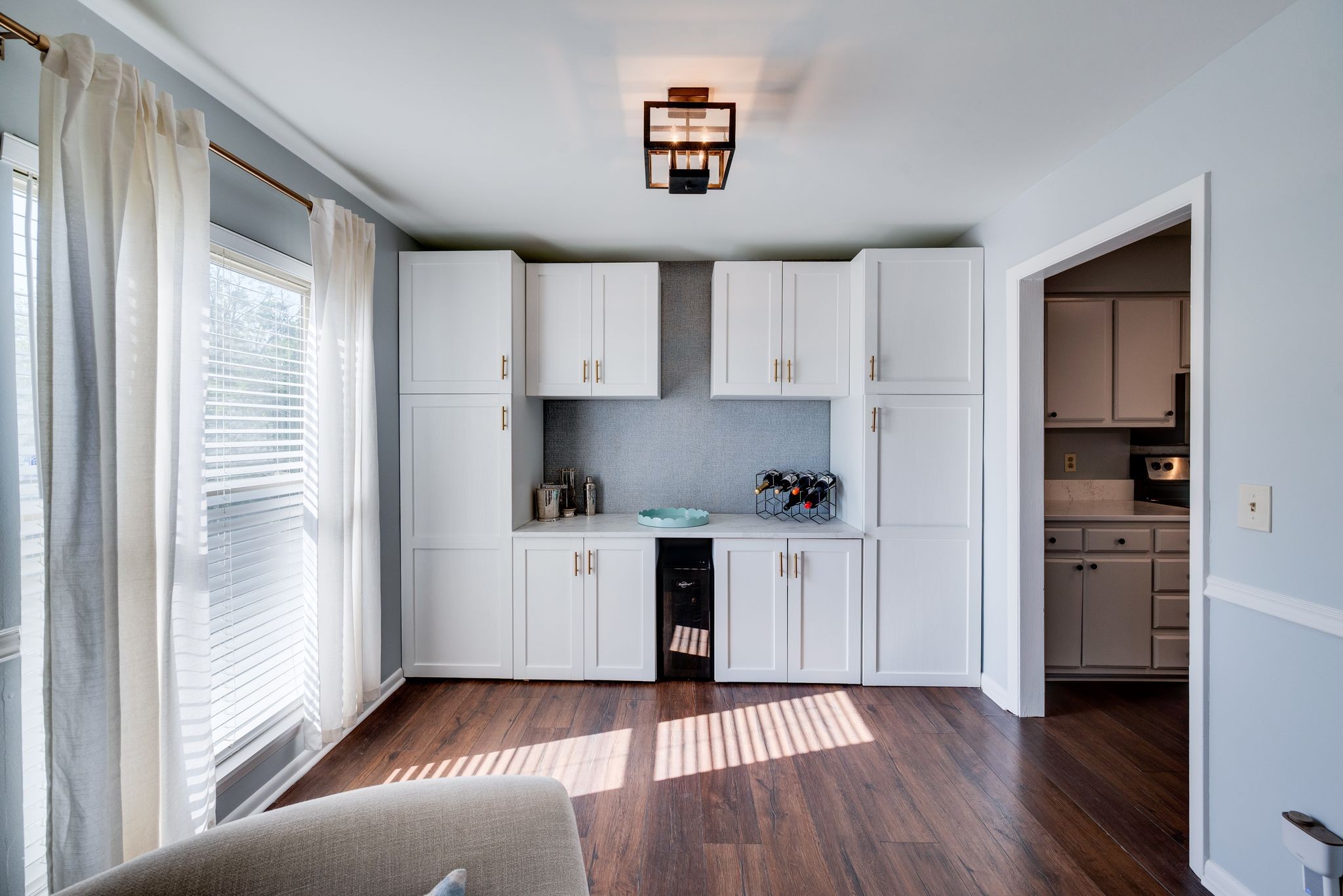 404 Summit Ridge Place Nashville, TN 37215 - Photo 6 of 19 a kitchen with white cabinets and a window