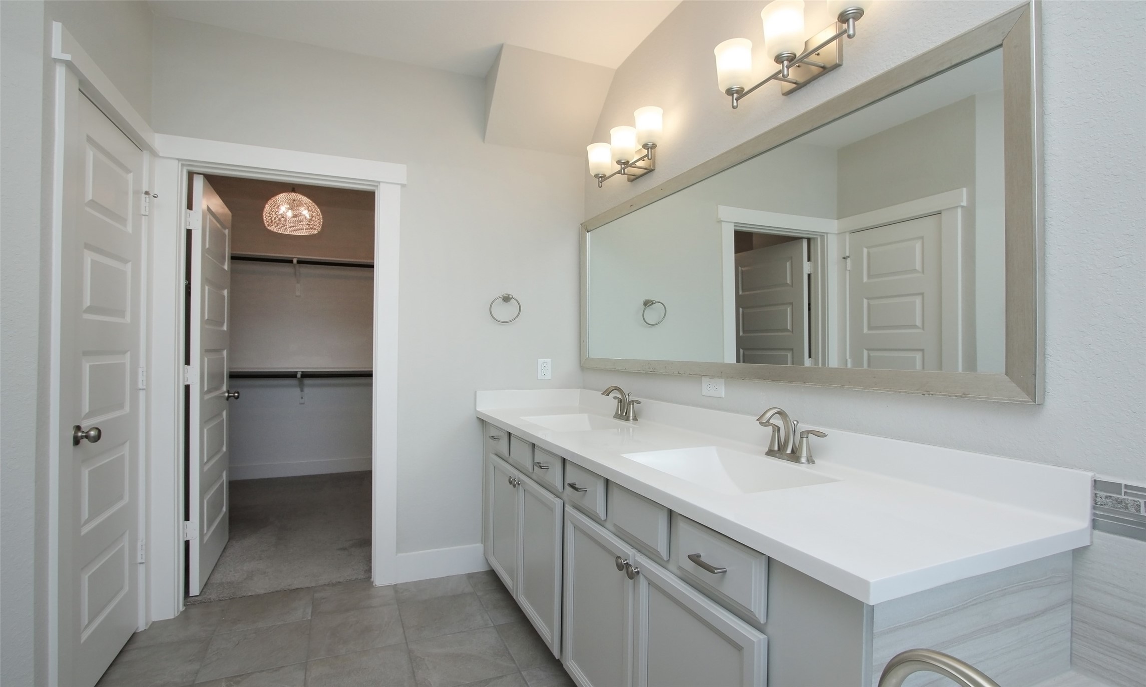 12502 Malachite Way Houston, TX 77077 - Photo 21 of 41 Dual vanity sinks located in the primary bathroom