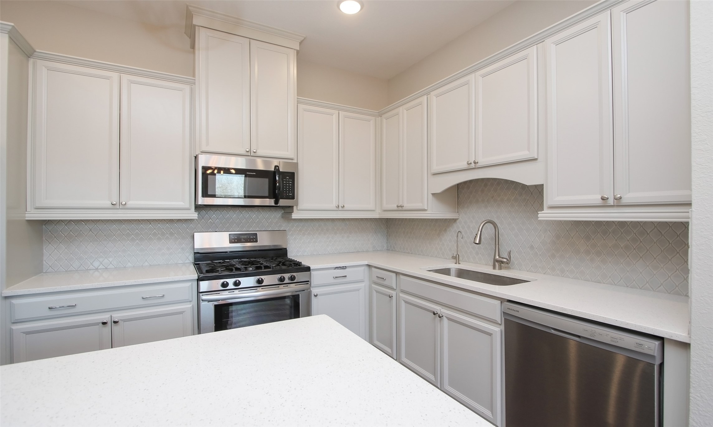 12502 Malachite Way Houston, TX 77077 - Photo 9 of 41 The gourmet kitchen includes Frigidaire stainless steel appliances