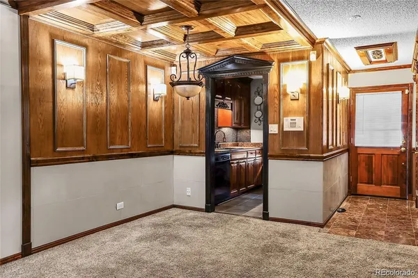 a kitchen with stainless steel appliances granite countertop a stove and a microwave