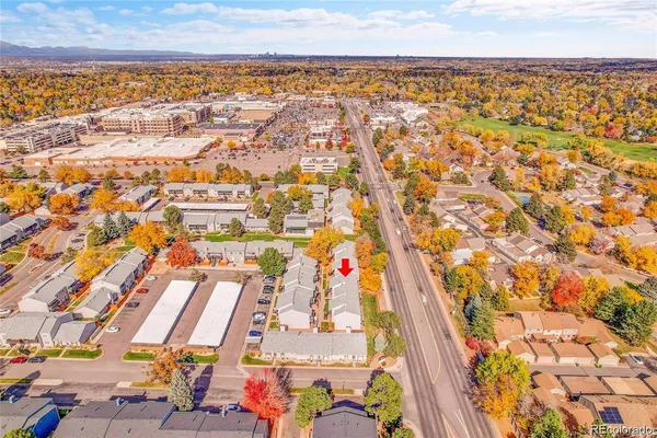 an aerial view of a city with streets and houses