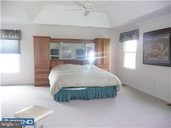 48 Hope Road Holland, PA 18966 - Photo 8 of 12 a bedroom with a bed and window