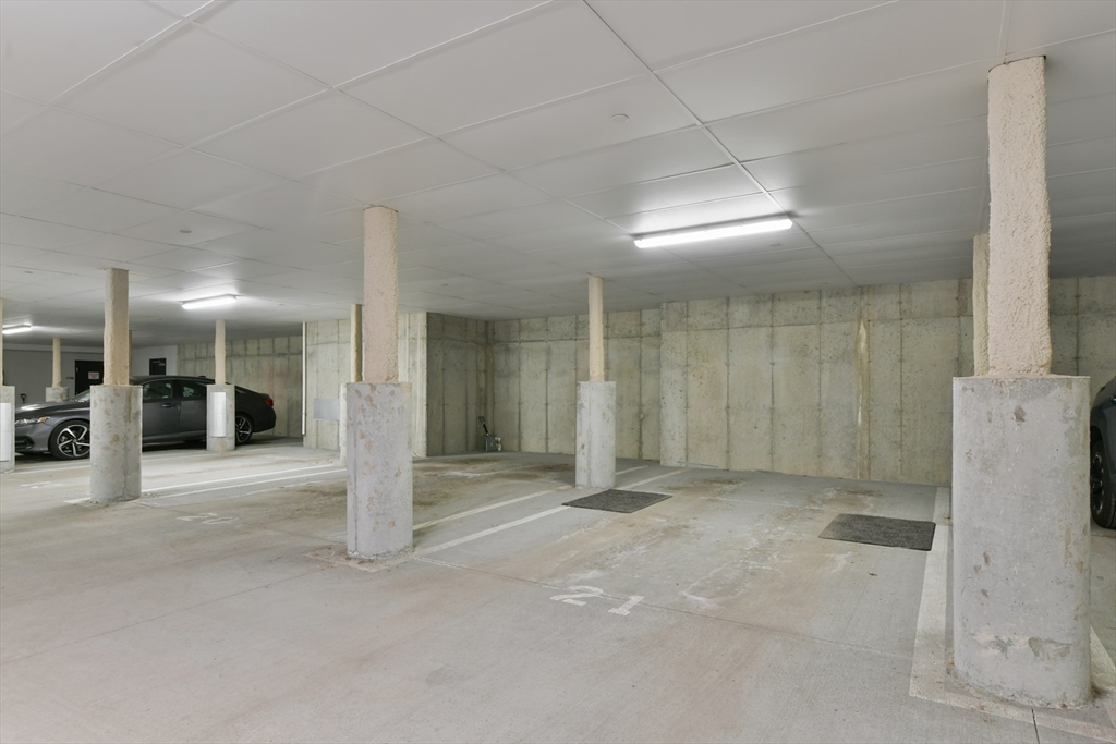 635 Old Post Road, Unit 2209 Sharon, MA 02067 - Photo 27 of 42 an empty room with entrance