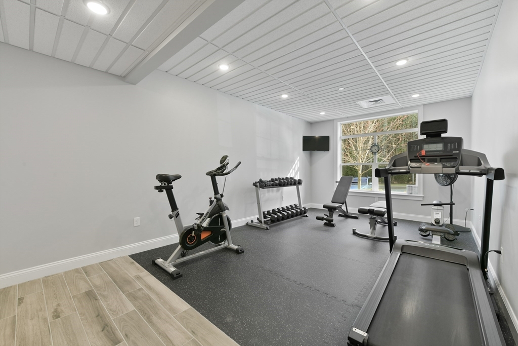 635 Old Post Road, Unit 2209 Sharon, MA 02067 - Photo 30 of 42 a view of a room with gym equipment