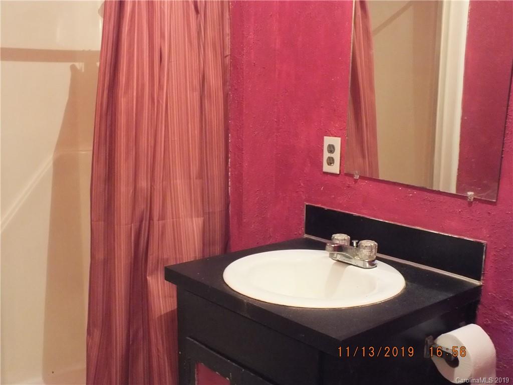 1136 Garnette Road Lancaster, SC 29720 - Photo 18 of 22 a bathroom with a sink and a mirror