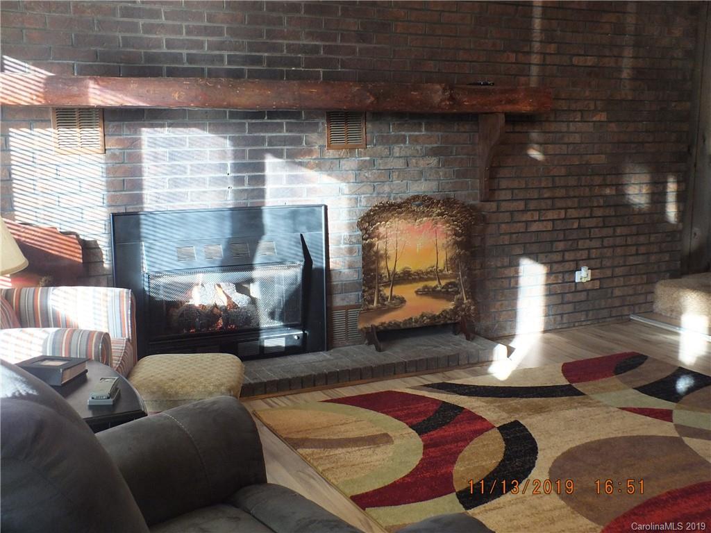 1136 Garnette Road Lancaster, SC 29720 - Photo 5 of 22 a living room with furniture and a fireplace