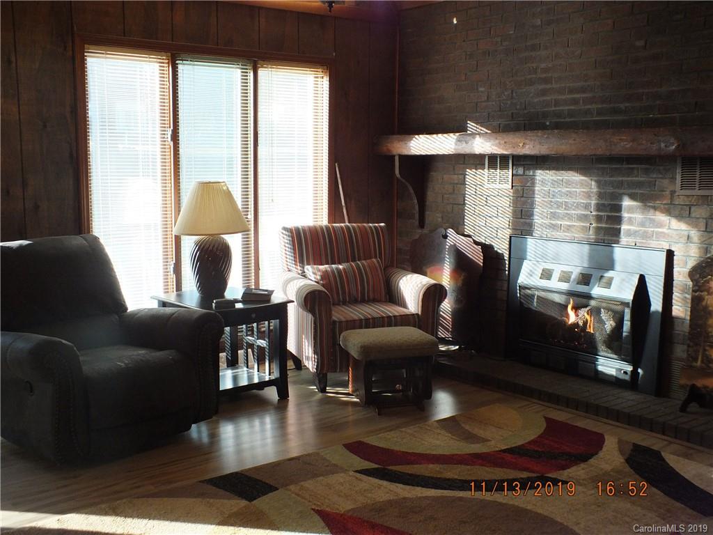 1136 Garnette Road Lancaster, SC 29720 - Photo 7 of 22 a living room with furniture and a fireplace
