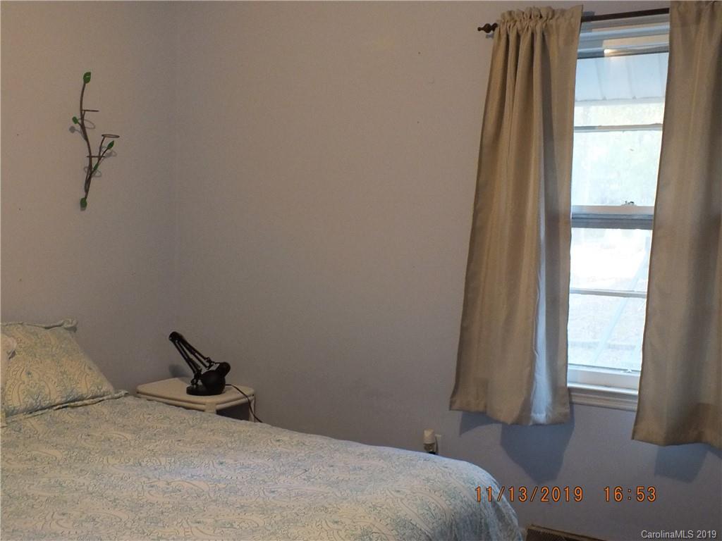 1136 Garnette Road Lancaster, SC 29720 - Photo 10 of 22 a bedroom with a bed and a window