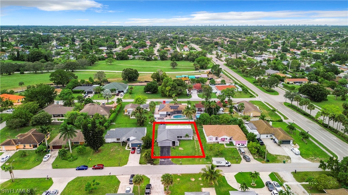 2437 42nd Terrace Southwest Naples, FL 34116 - Photo 33 of 34 a view of a city