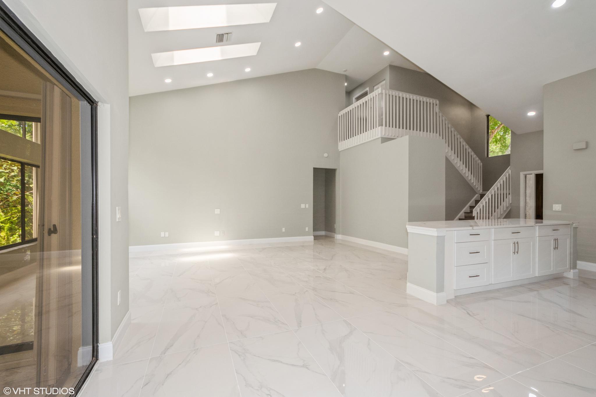 747 St Albans Drive Boca Raton, FL 33486 - Photo 6 of 40 07_747SaintAlbansDrive_93_LivingRoomDini