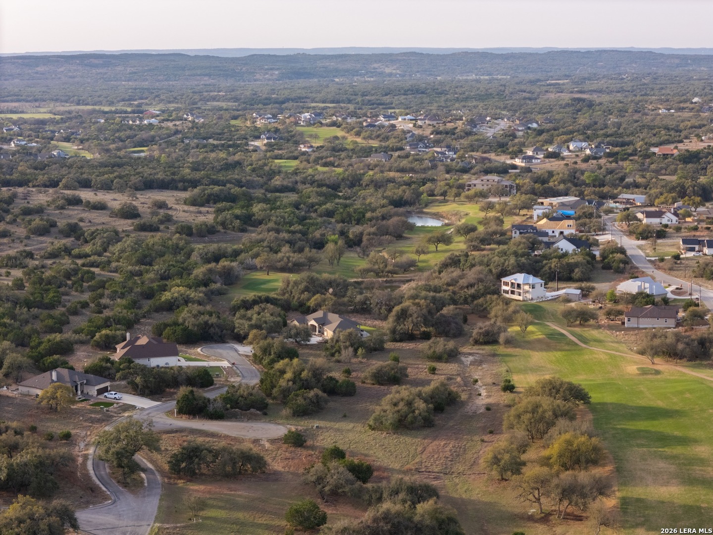 116 South Jesse Stiff Blanco, TX 78606 - Photo 8 of 11 a view of city and mountain