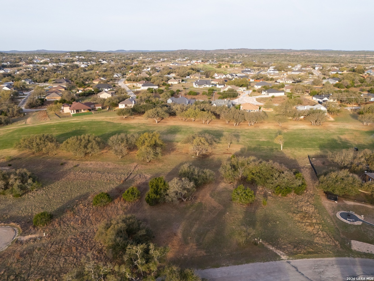 116 South Jesse Stiff Blanco, TX 78606 - Photo 10 of 11 an aerial view of residential houses with outdoor space
