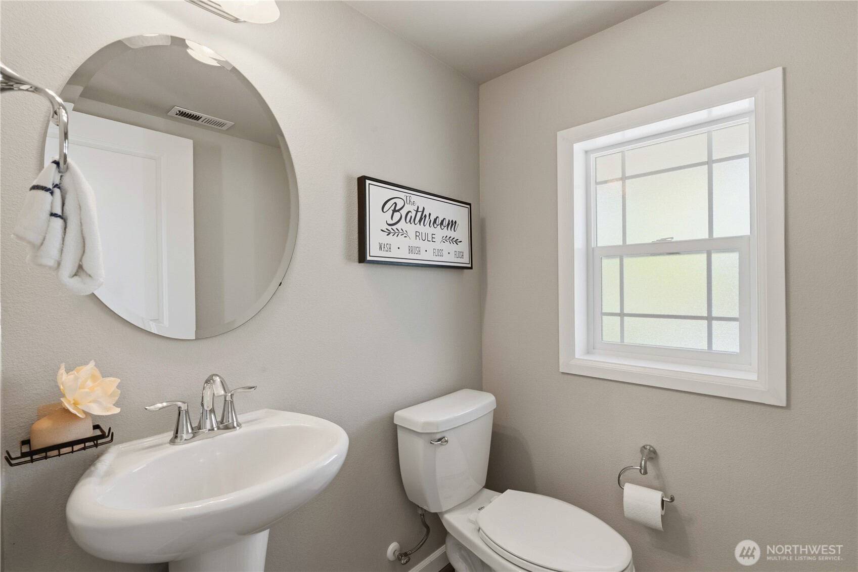 23615 43rd Drive Southeast Bothell, WA 98021 - Photo 15 of 35 a bathroom with a toilet sink and mirror