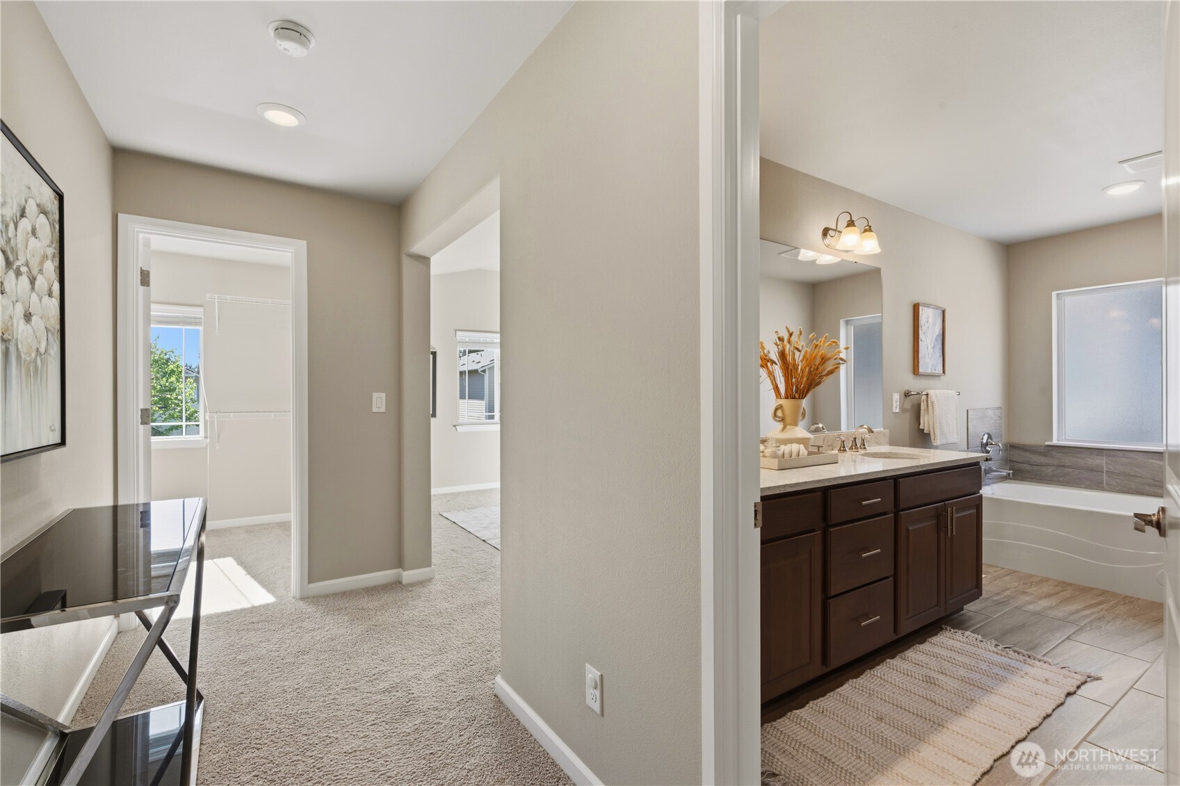 23615 43rd Drive Southeast Bothell, WA 98021 - Photo 21 of 35 a spacious bathroom with a granite countertop sink a mirror and a bathtub