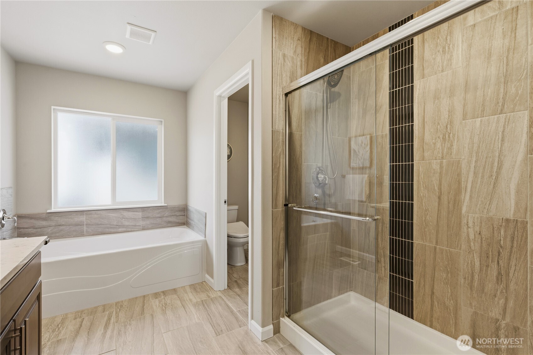 23615 43rd Drive Southeast Bothell, WA 98021 - Photo 23 of 35 a bathroom with a bathtub and a shower