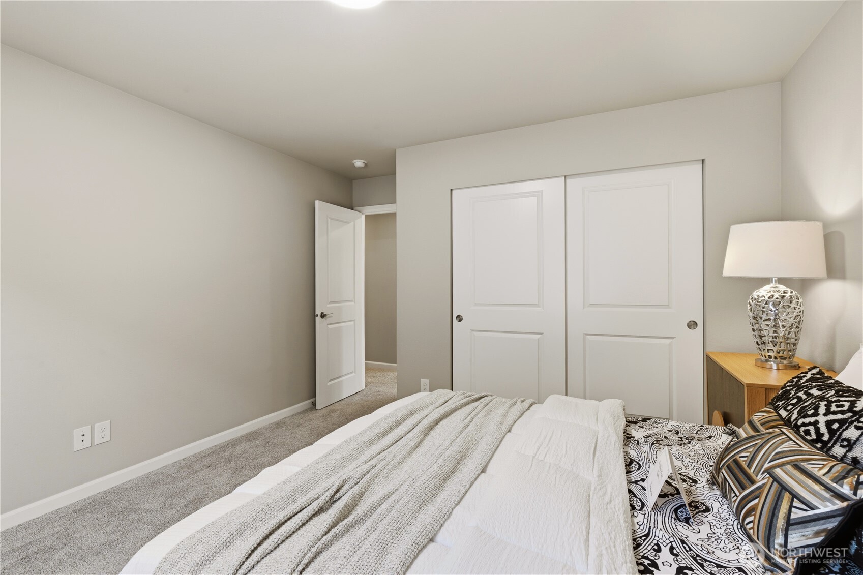 23615 43rd Drive Southeast Bothell, WA 98021 - Photo 25 of 35 a bedroom with a bed and a lamp