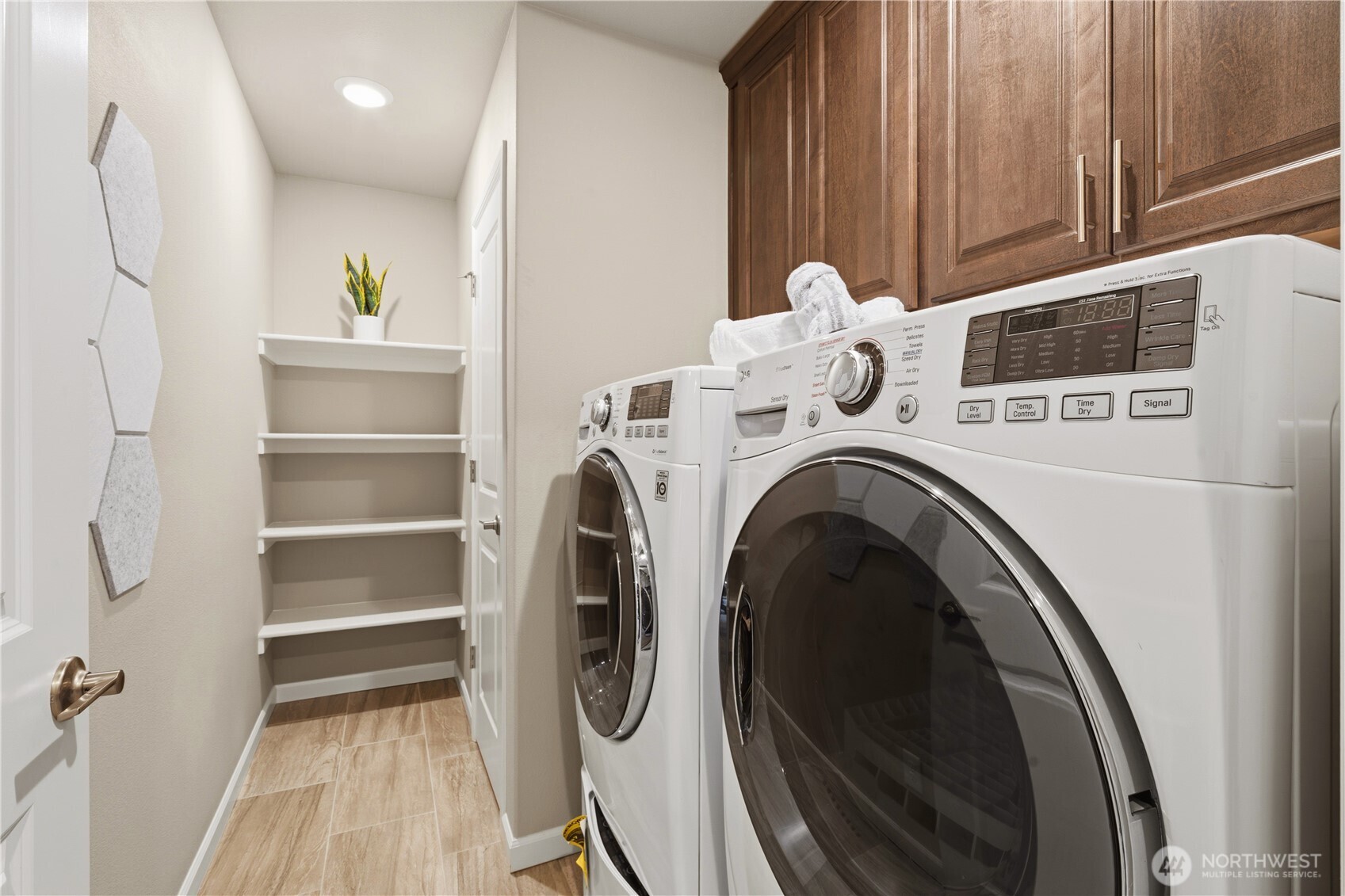 23615 43rd Drive Southeast Bothell, WA 98021 - Photo 32 of 35 a view of a storage and utility room with washer and dryer