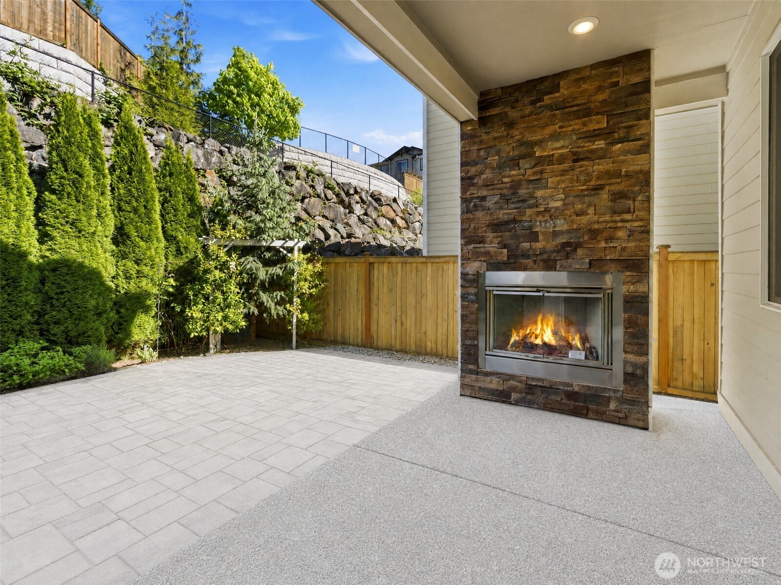 23615 43rd Drive Southeast Bothell, WA 98021 - Photo 34 of 35 a view of an empty room with a fireplace and a garage