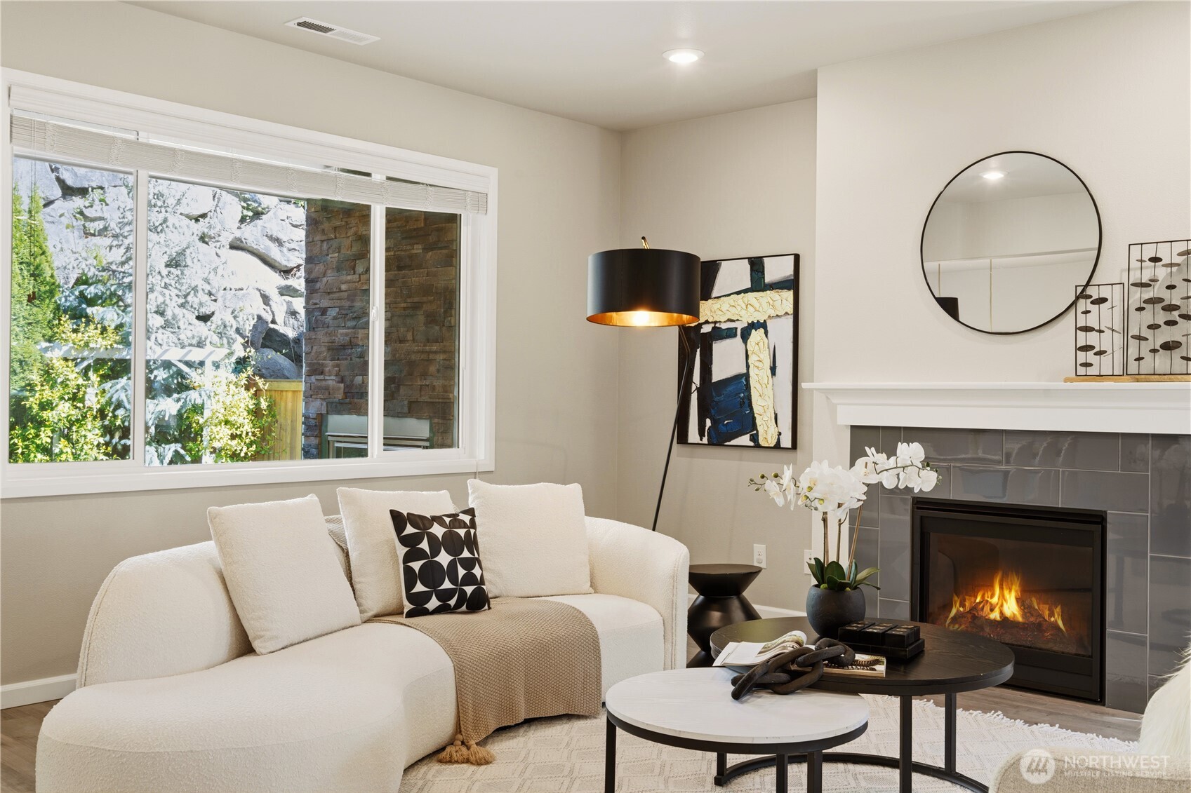 23615 43rd Drive Southeast Bothell, WA 98021 - Photo 5 of 35 a living room with furniture a window and a fireplace
