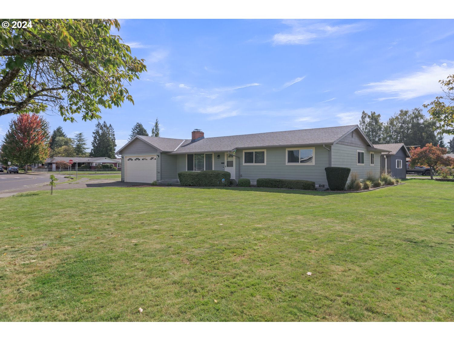 3217 Maple Street Longview, WA 98632 - Photo 30 of 32 a view of a house with a yard